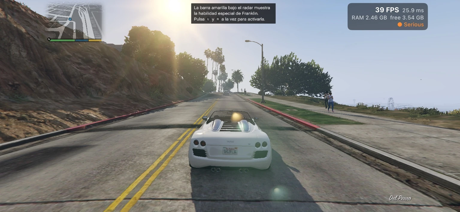 A white sports car on a sunlit road in Del Perro.